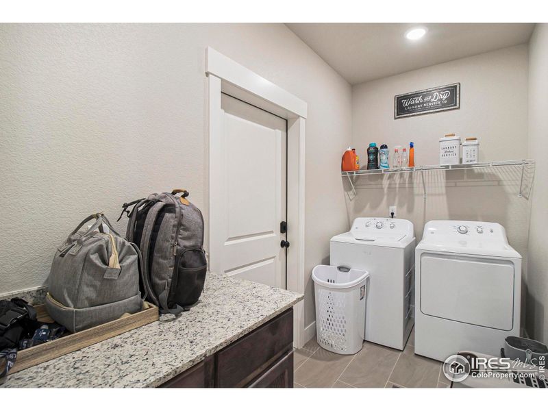 Furnished interior view inside a new home in Highlands at Fox Hill - The Flats, Longmont (Image 11). Furnished interior view inside a new home in Highlands at Fox Hill - The Flats, Longmont (Image 11).