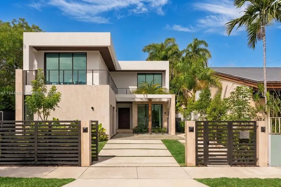 Front exterior of a new home in , Miami, FL, highlighting curb appeal (Image 1). Front exterior of a new home in , Miami, FL, highlighting curb appeal (Image 1).