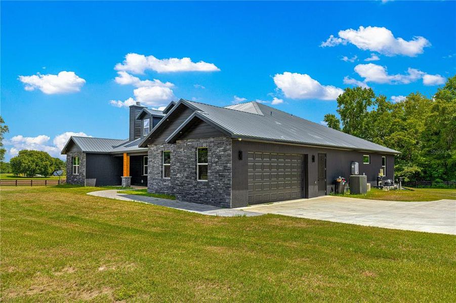 Front exterior of a new home in , Ocala, FL, highlighting curb appeal (Image 23). Front exterior of a new home in , Ocala, FL, highlighting curb appeal (Image 23).
