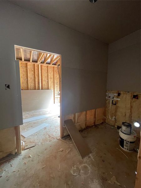 Oversized laundry room conveniently located near the garage