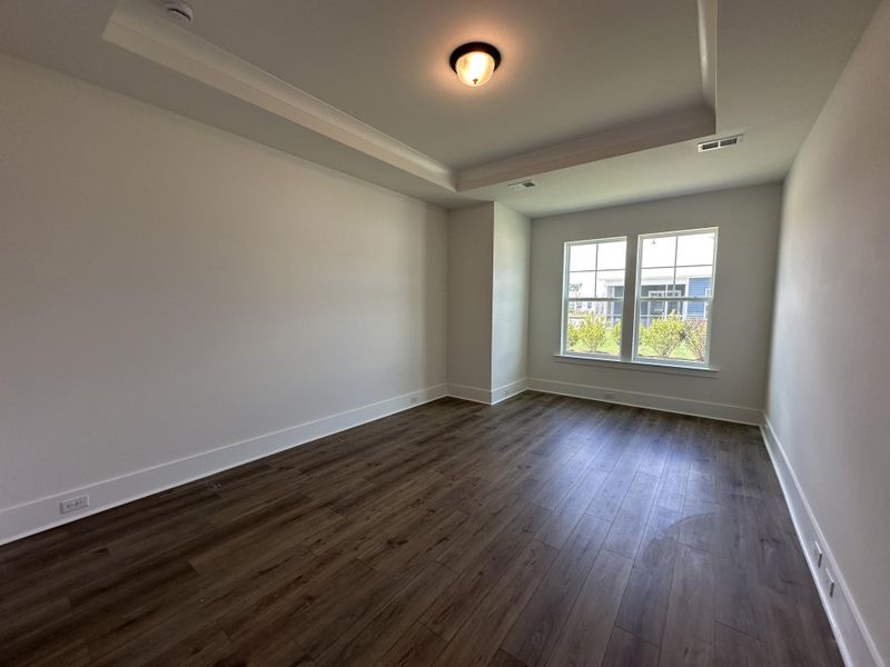 Spacious, unfurnished interior of a new home in Summerwind Crossing at Lakes of Cane Bay, Summerville (Image 16).