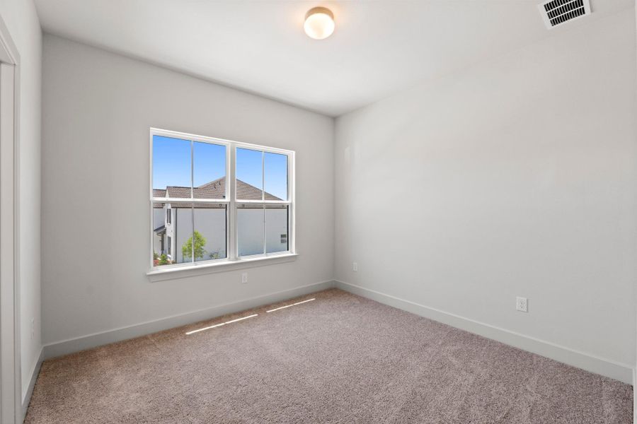 Spacious, unfurnished interior of a new home in Parmer Ranch, Georgetown (Image 22).