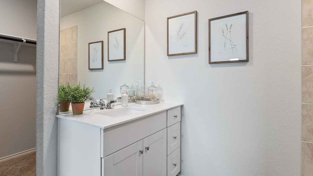 Representative furnished interior of a home built from the Barton by D.R. Horton in Watermark, Alvin (Image 13).