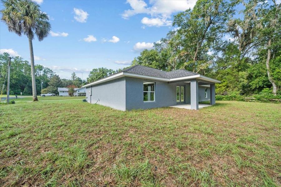 Front exterior of a new home in , Dunnellon, FL, highlighting curb appeal (Image 19).