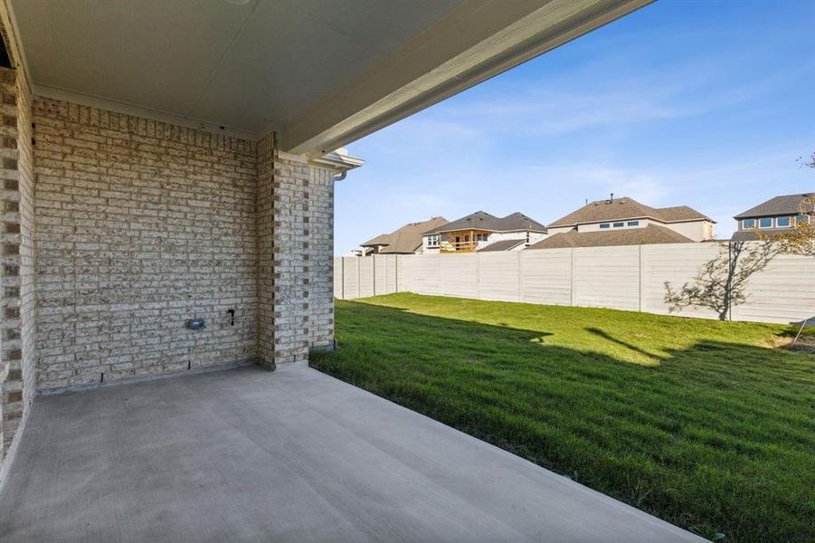 View of yard with a patio