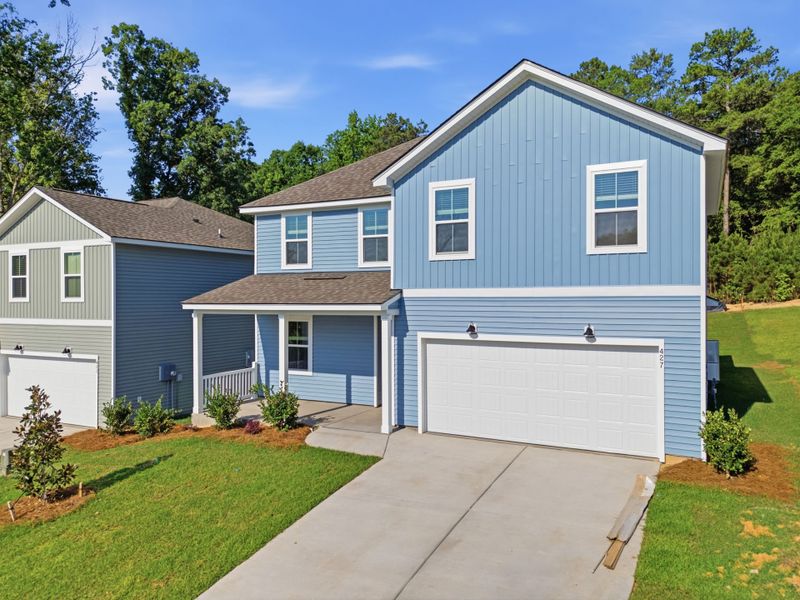Front exterior of a new home in Grand Arbor, Blythewood, SC, highlighting curb appeal (Image 19). Front exterior of a new home in Grand Arbor, Blythewood, SC, highlighting curb appeal (Image 19).
