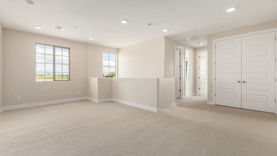 Representative furnished interior of a home built from the The Delaney by DRB Homes in Surprise City Center, Surprise (Image 19).