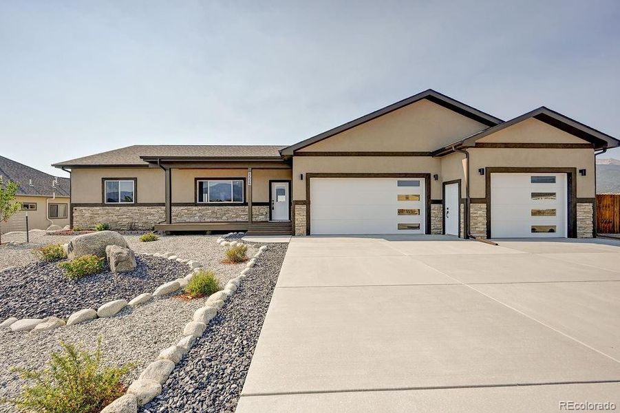 Front exterior of a new home in , Buena Vista, CO, highlighting curb appeal (Image 15). Front exterior of a new home in , Buena Vista, CO, highlighting curb appeal (Image 15).