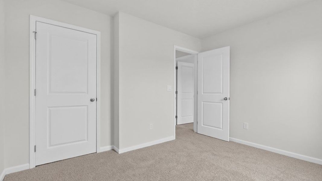 Spacious, unfurnished interior of a new home in Mangum Farms, Stem (Image 21). Spacious, unfurnished interior of a new home in Mangum Farms, Stem (Image 21).
