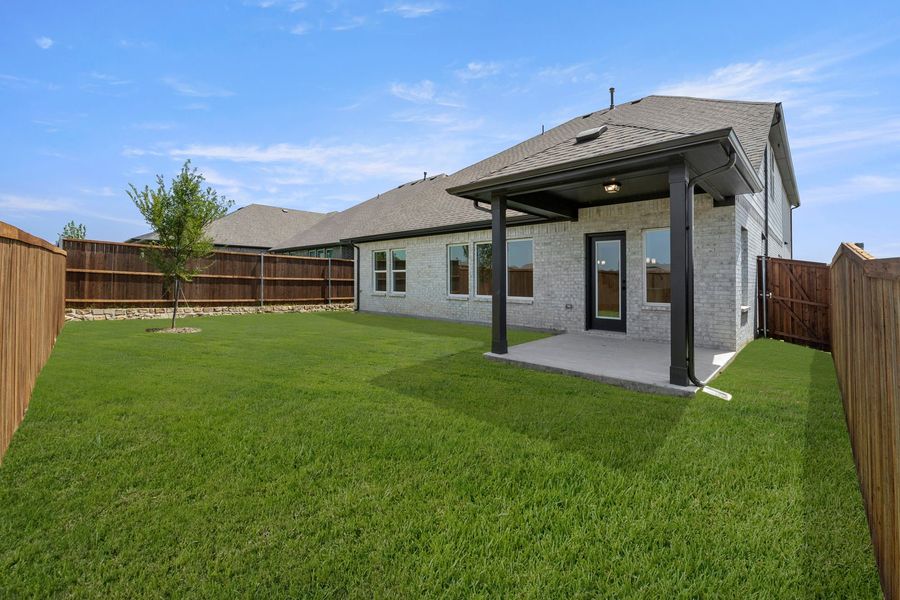Exterior details and patio area of a home in Creekside, Royse City (Image 2). Exterior details and patio area of a home in Creekside, Royse City (Image 2).