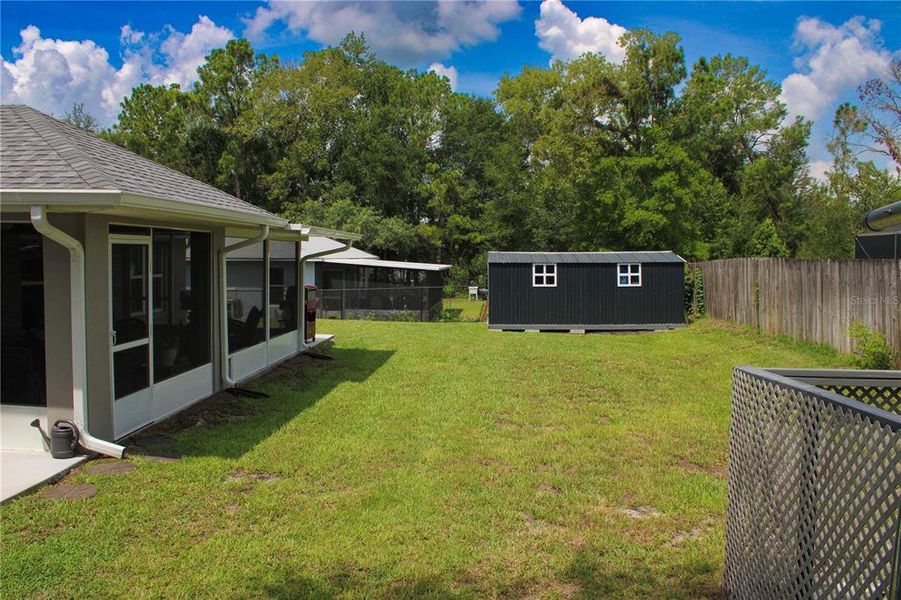 Exterior details and patio area of a home in , Summerfield (Image 23).
