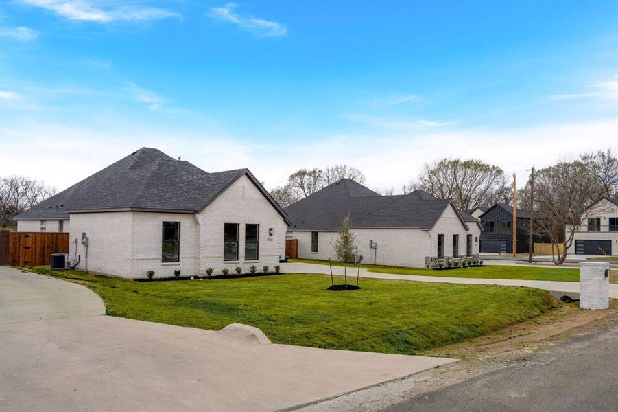 Front exterior of a new home in , Glenn Heights, TX, highlighting curb appeal (Image 18).
