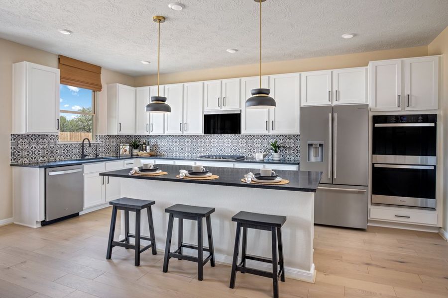 Representative furnished interior of a home built from the 2343 Modeled by KB Home in Davina, Rosenberg (Image 5).