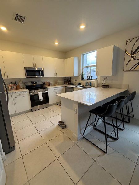 Furnished interior view inside a new home in , Coral Springs (Image 4). Furnished interior view inside a new home in , Coral Springs (Image 4).