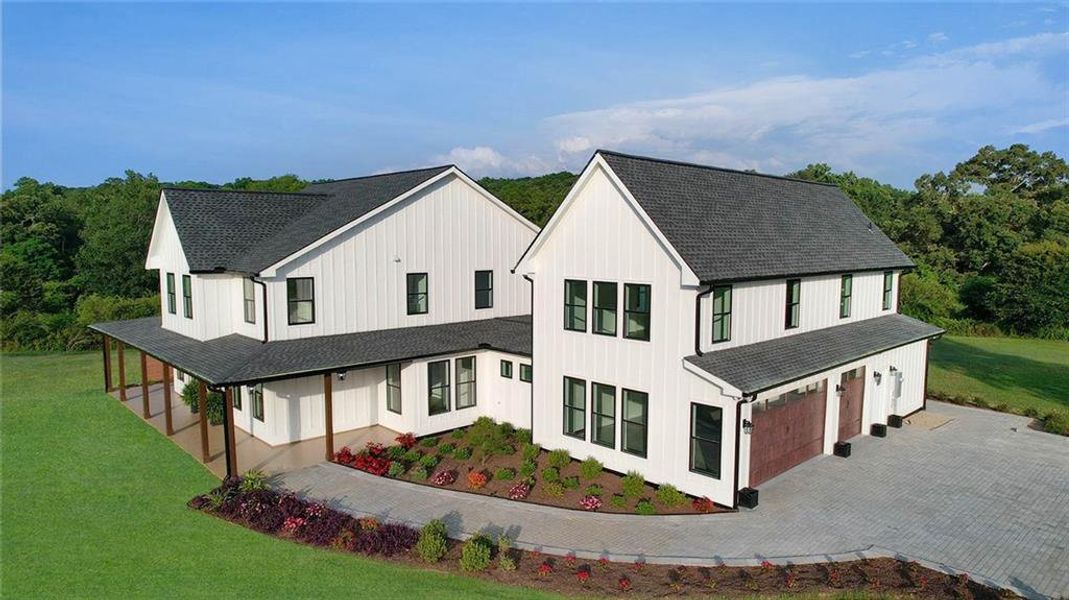 Front exterior of a new home in , Canton, GA, highlighting curb appeal (Image 26).