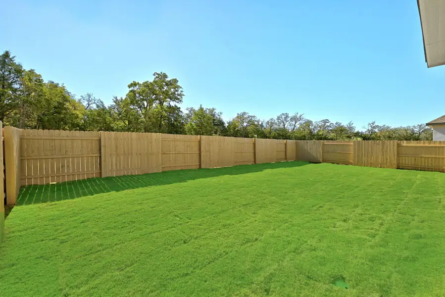 Exterior details and patio area of a home in The Colony - 50', Bastrop (Image 2). Exterior details and patio area of a home in The Colony - 50', Bastrop (Image 2).