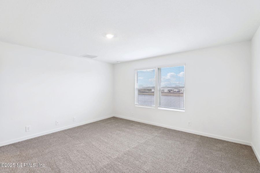 Spacious, unfurnished interior of a new home in Lakes at Bella Lago - Signature Series, Green Cove Springs (Image 29). Spacious, unfurnished interior of a new home in Lakes at Bella Lago - Signature Series, Green Cove Springs (Image 29).