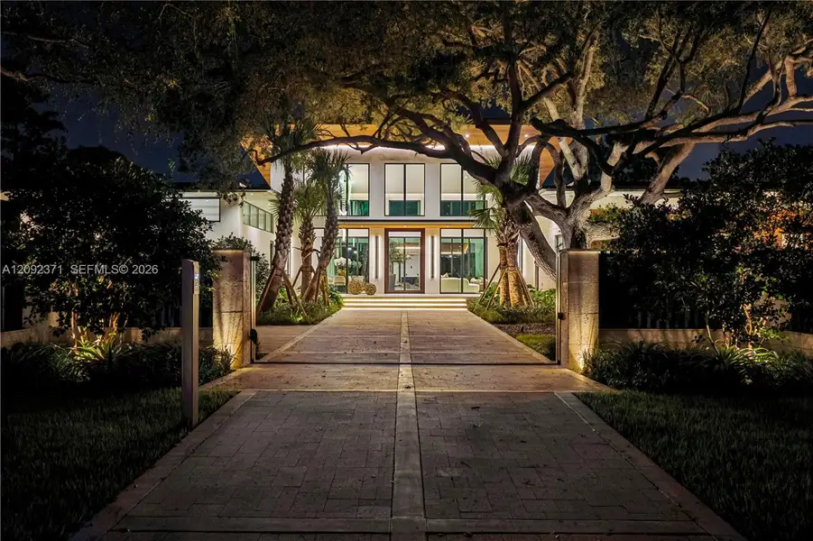 Front exterior of a new home in , Pinecrest, FL, highlighting curb appeal (Image 2).