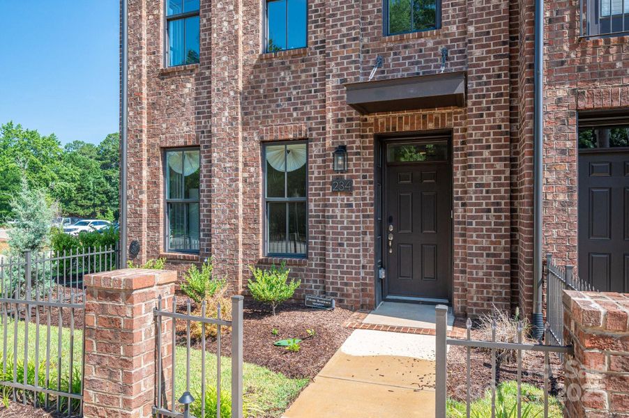 Front exterior of a new home in , Huntersville, NC, highlighting curb appeal (Image 24).