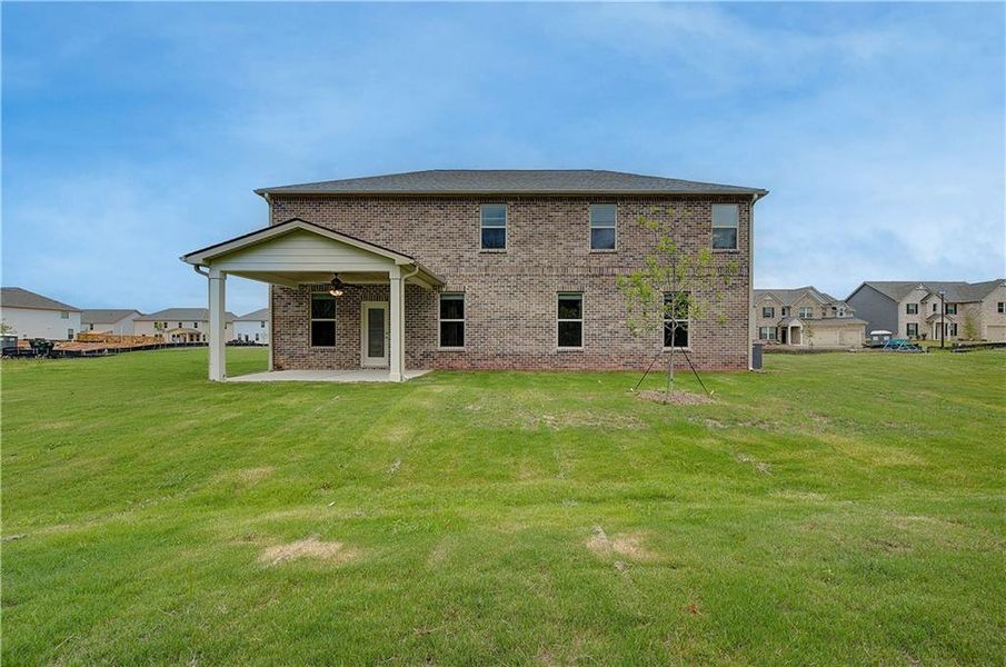 Exterior details and patio area of a home in Adagio, Dacula (Image 4).