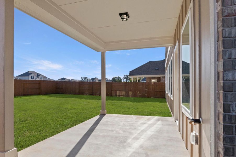 Exterior details and patio area of a home in Oaks at San Gabriel, Georgetown (Image 3).