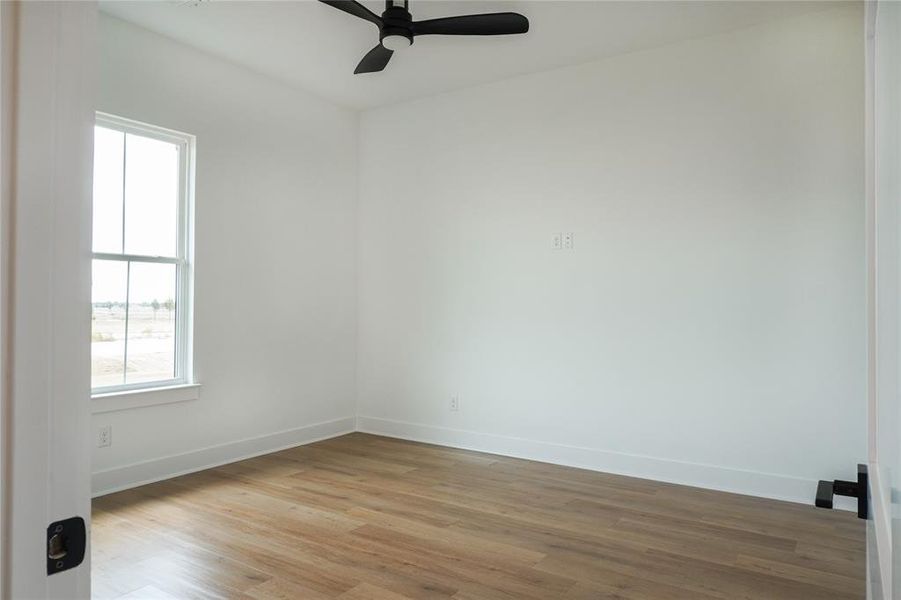 Washroom featuring cabinets, dark hardwood / wood-style flooring, electric dryer hookup, and hookup for a washing machine