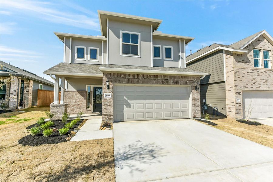 Front exterior of a new home in Colony at Pinehurst, Pinehurst, TX, highlighting curb appeal (Image 22).