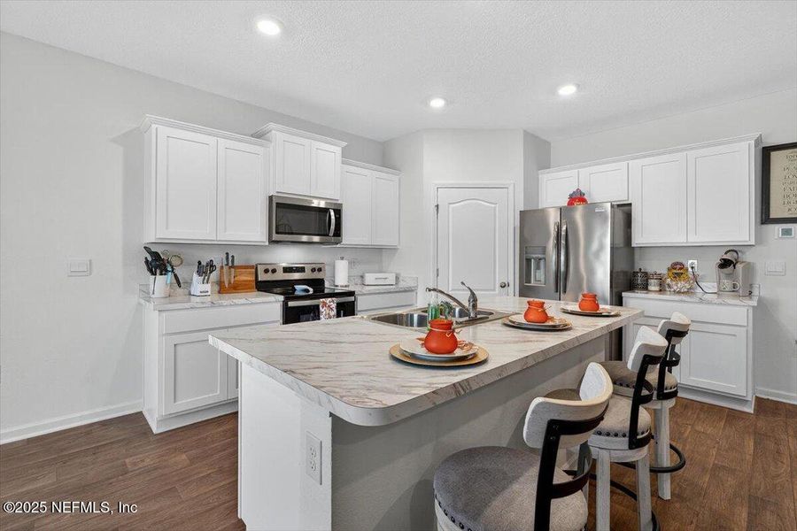 Furnished interior view inside a new home in River Glen Express, Yulee (Image 7).