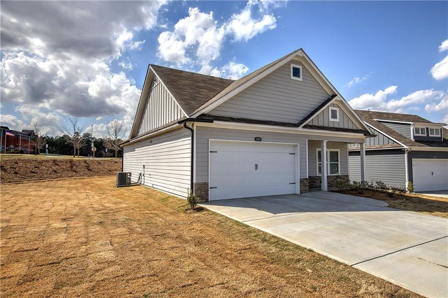 Front exterior of a new home in , Cartersville, GA, highlighting curb appeal (Image 27).