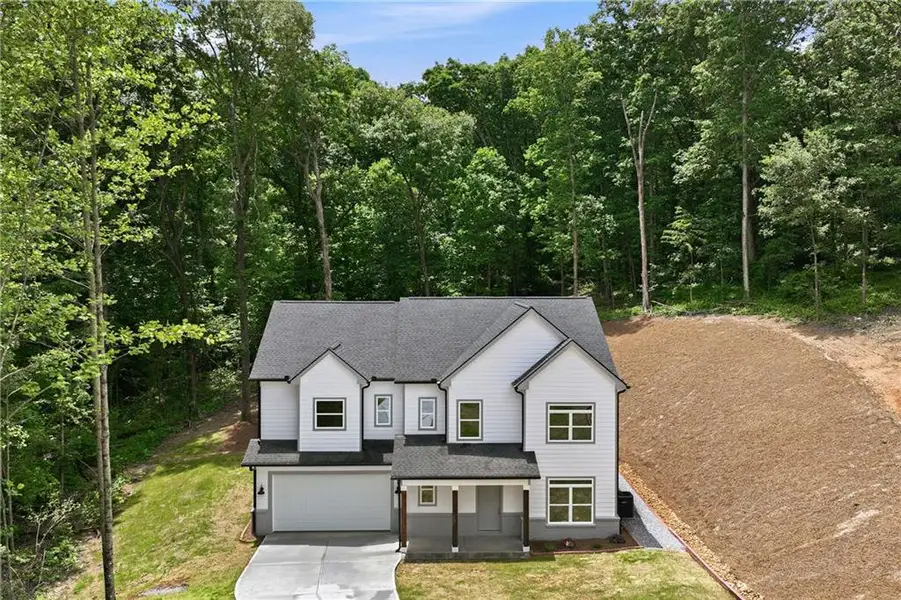Front exterior of a new home in , Clermont, GA, highlighting curb appeal (Image 2). Front exterior of a new home in , Clermont, GA, highlighting curb appeal (Image 2).