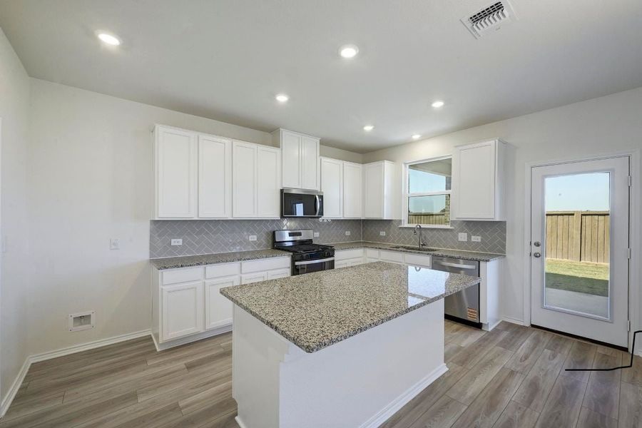Furnished interior view inside a new home in Centerpoint Meadows, Lockhart (Image 5).