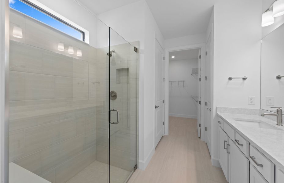 Spacious glass shower in owner's bathroom Spacious glass shower in owner's bathroom