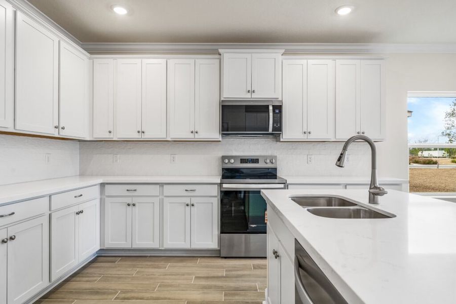 Furnished interior view inside a new home in Natureview, Freeport (Image 7).