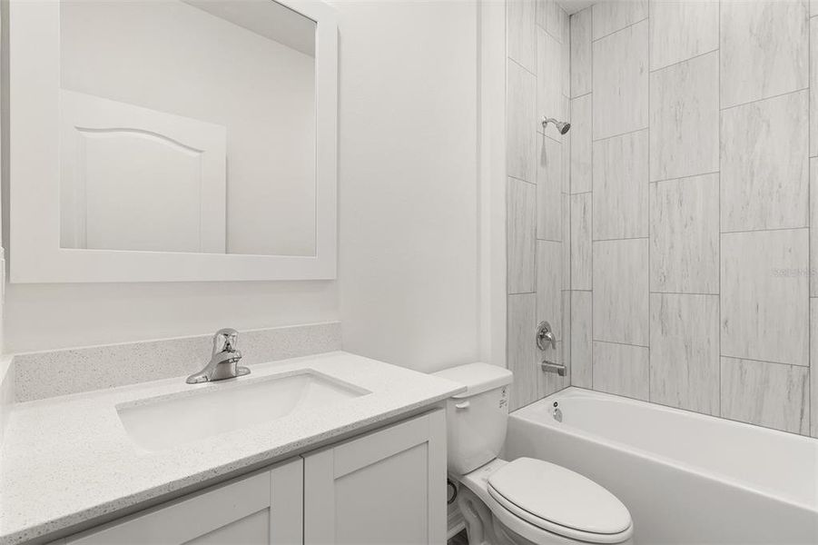 Furnished interior view inside a new home in Peach Crossings, Winter Haven (Image 8).