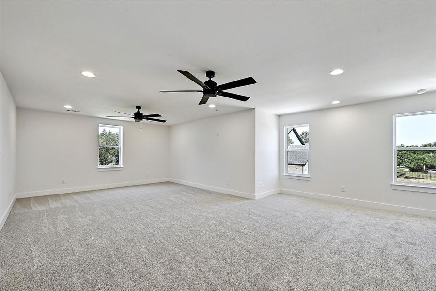 The only room with carpet, this huge gameroom or 5th bedroom is the only room upstairs and has a multitude of roles depending on your needs.