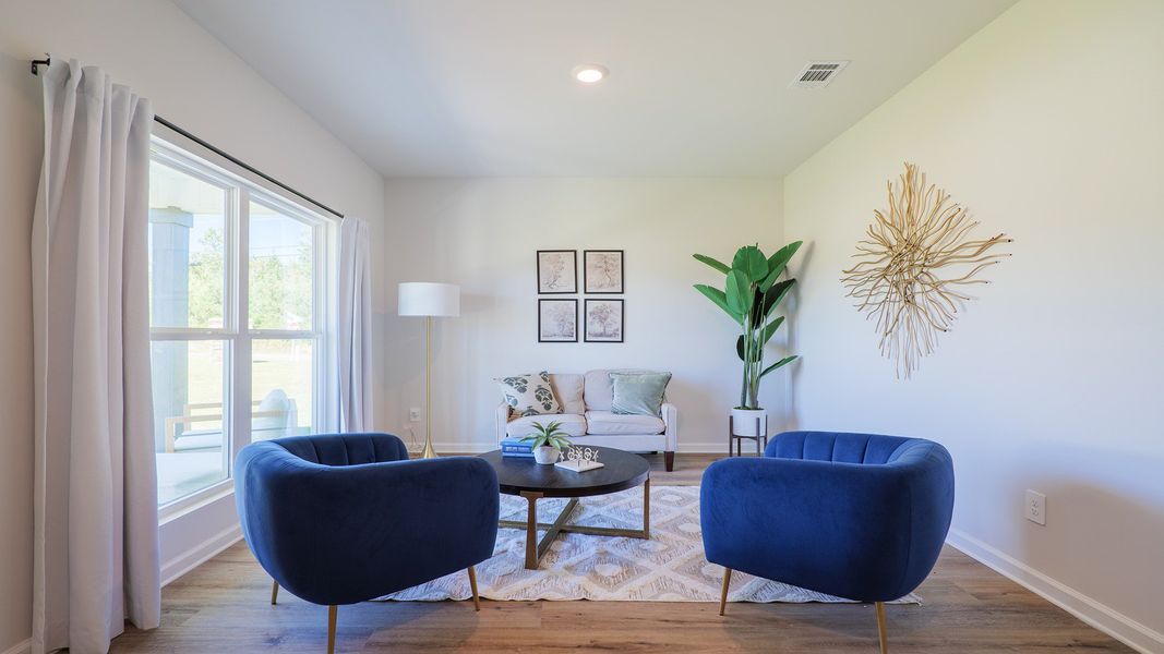 Representative furnished interior of a home built from the The Carol by D.R. Horton in Olson Ridge, Tallahassee (Image 4).
