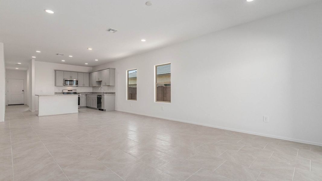 Representative unfurnished interior of a home built from the Parker by D.R. Horton in Saguaro Bloom, Marana (Image 13). Representative unfurnished interior of a home built from the Parker by D.R. Horton in Saguaro Bloom, Marana (Image 13).