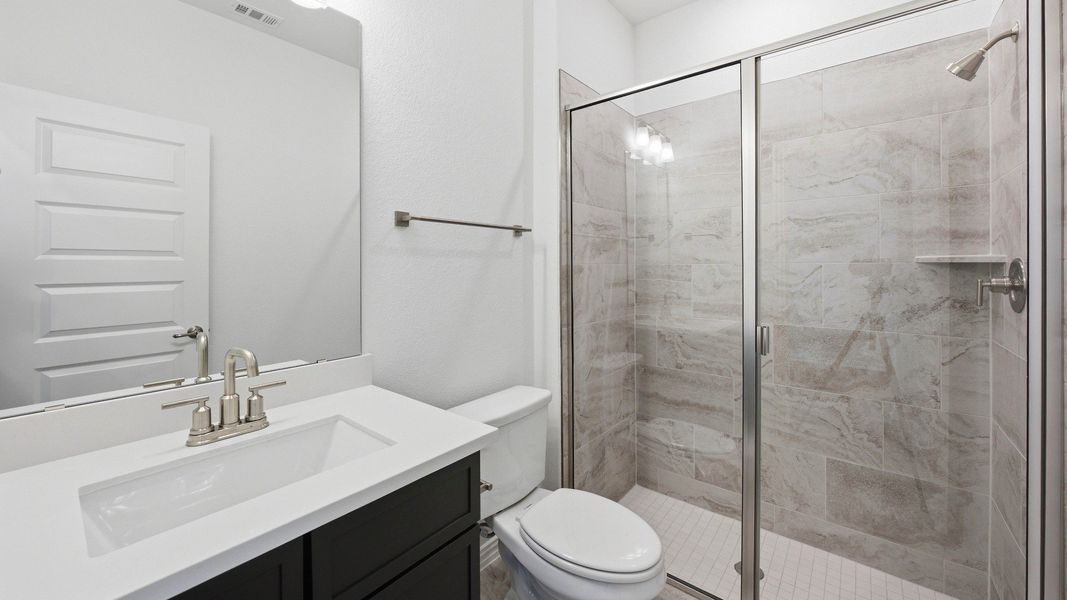 Furnished interior view inside a new home in Oaks at San Gabriel, Georgetown (Image 16).