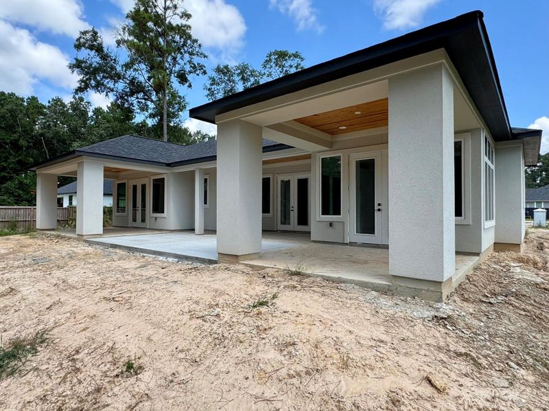 Front exterior of a new home in , Splendora, TX, highlighting curb appeal (Image 26).