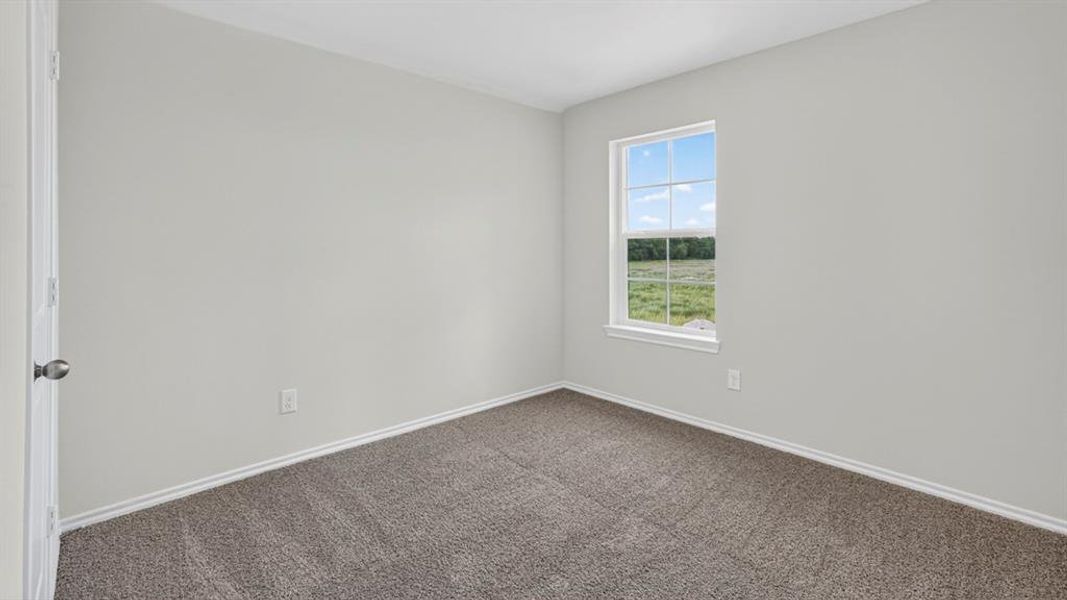 Neutral-toned walls complement the gray carpeting Neutral-toned walls complement the gray carpeting