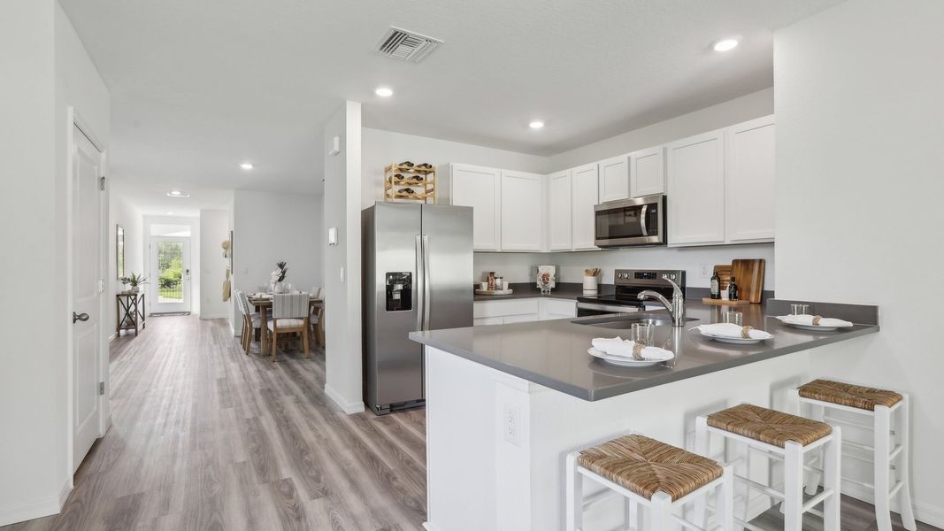 Representative furnished interior of a home built from the Allex II by D.R. Horton in Deerbrook, Land O' Lakes (Image 13).