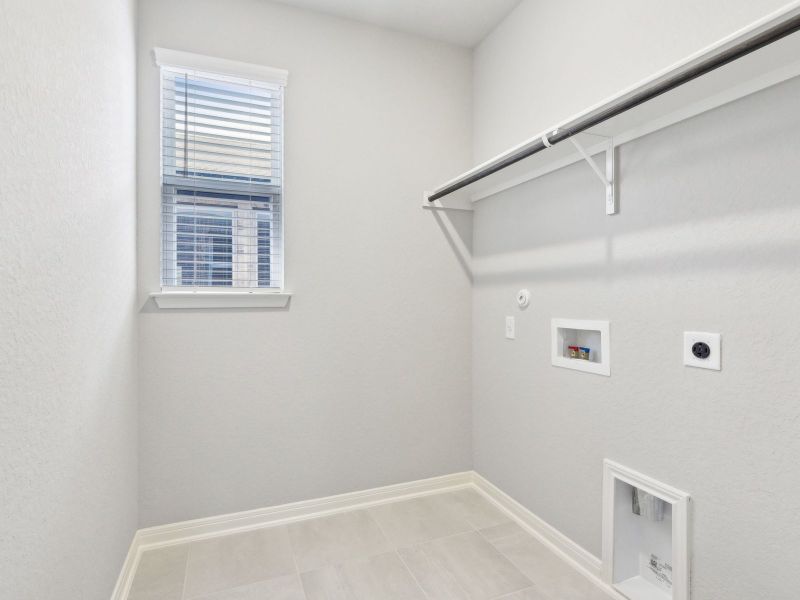 Laundry room in the San Jacinto floorplan at a Meritage Homes community.