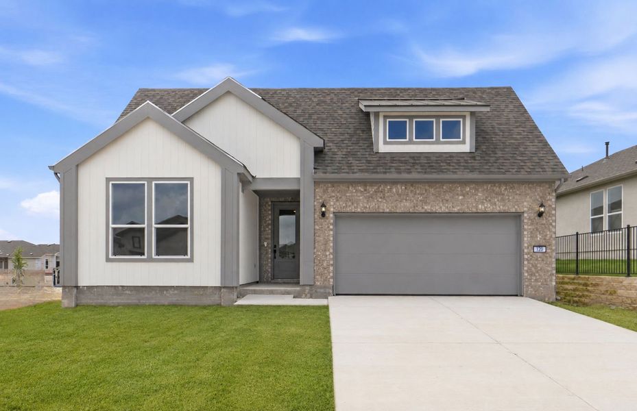 Front exterior of a new home in Sun City Texas, Georgetown, TX, highlighting curb appeal (Image 21). Front exterior of a new home in Sun City Texas, Georgetown, TX, highlighting curb appeal (Image 21).