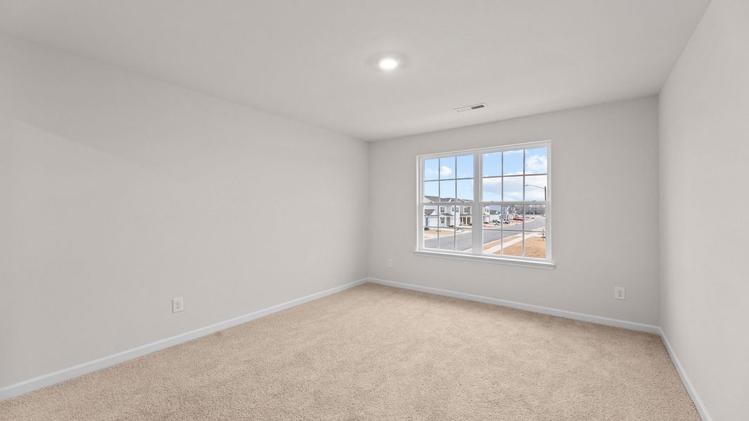 Spacious, unfurnished interior of a new home in Ridgewood Farms, Winterville (Image 19).