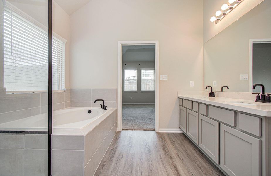 Luxurious well sized primary bath.