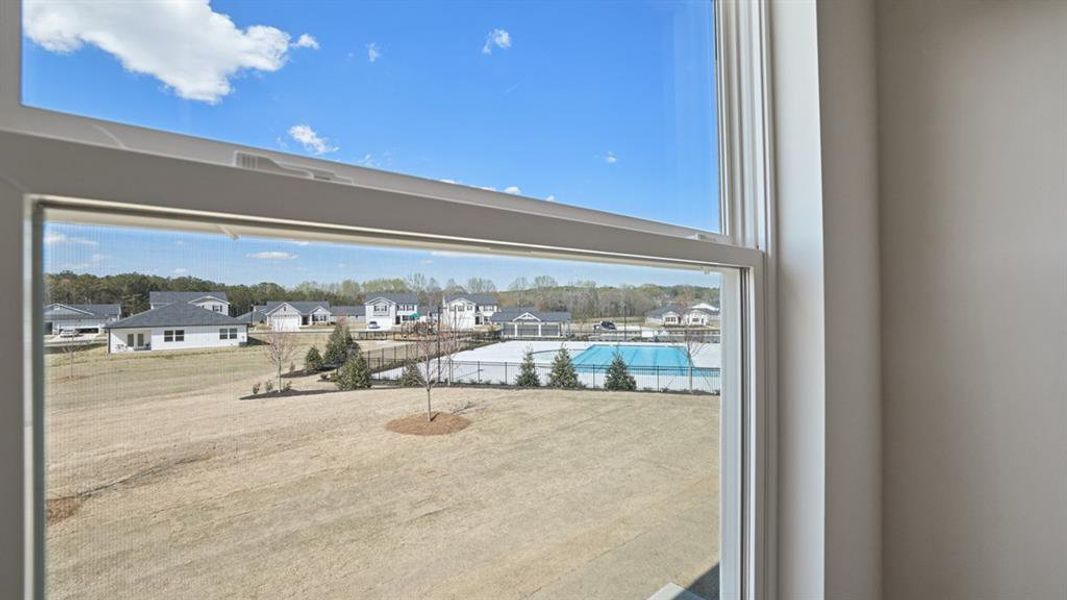 Exterior details and patio area of a home in Champion's Run, Lithonia (Image 19).