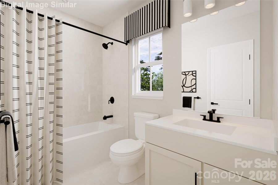 The shared bathroom features sleek, modern lines and a bright, inviting design, complete with a stylish tub for added comfort and convenience. The shared bathroom features sleek, modern lines and a bright, inviting design, complete with a stylish tub for added comfort and convenience.