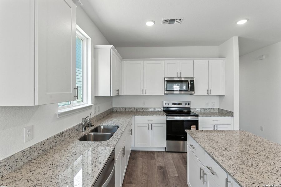 Furnished interior view inside a new home in , New Braunfels (Image 7).