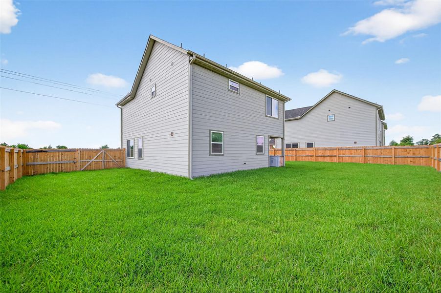 Front exterior of a new home in , Cleveland, TX, highlighting curb appeal (Image 23).
