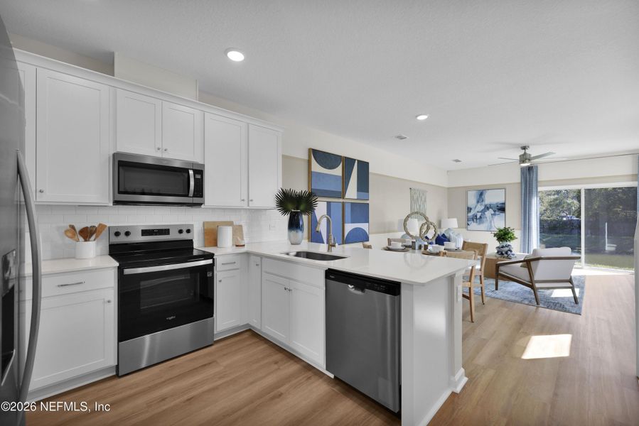 Furnished interior view inside a new home in Baxley Villas, Middleburg (Image 8).